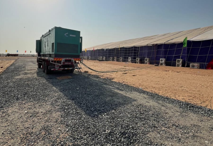 Excel Gentech generator deployed and cabled to a large event tent for short-term hire